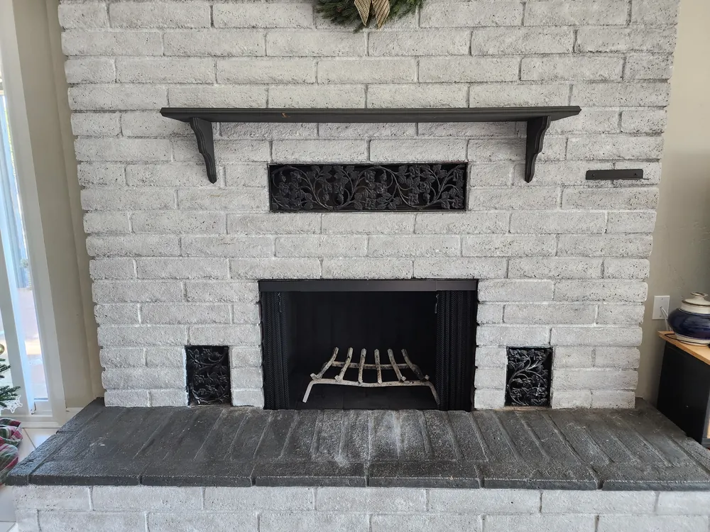 White brick fireplace after cleaning